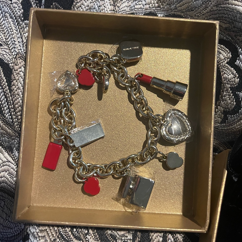 Dolce Gabbana Gold-Tone Makeup Charm Bracelet 125$